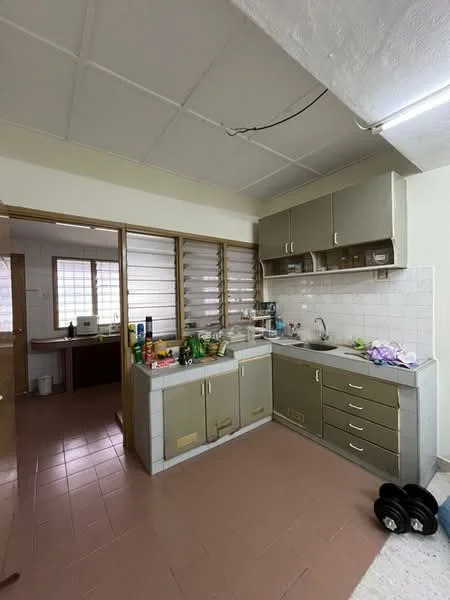 Kitchen features: laminate countertop, stainless-steel sink, chrome faucet, upper cabinets with glass fronts, lower cabinets in grey, tile backsplash, pink tile flooring, window with horizontal slats, kitchen appliances visible, open layout to adjacent room. Room features: tile flooring, window with horizontal slats.