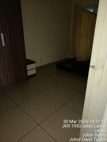Room features: cream painted walls, light brown tiled flooring, dark wood wardrobe, black sofa, curtains, small side table.