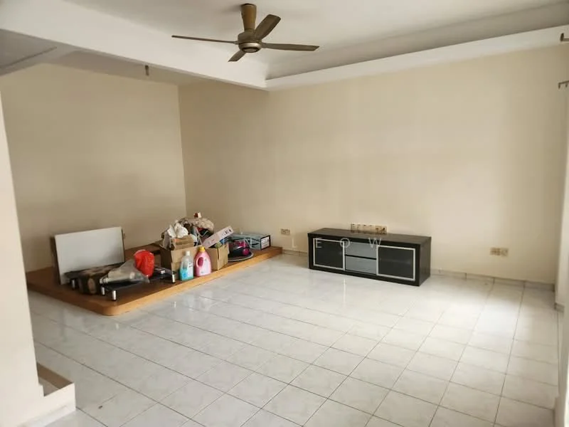 Living features: white painted walls, ceramic tile flooring, 5-blade ceiling fan, large window with sheer curtains, black TV console, wooden platform area, various boxes and items scattered, neutral ceiling, no visible decor.