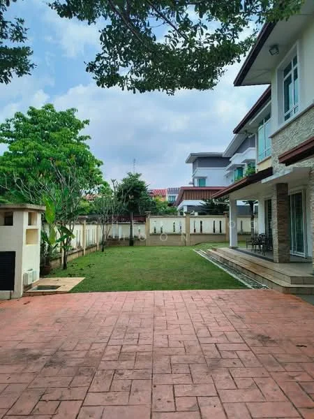 Exterior type: detached bungalow; features: manicured lawn, paved patio area, landscaped garden, mature trees, fenced perimeter, outdoor seating area, two-storey structure, stone cladding on facade, white painted facade, sliding glass doors, balcony on upper floor; style: modern.