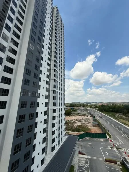 Exterior type: high-rise condominium; features: glass curtain wall, white painted facade, grey accent panels, recessed balconies, approximately 20-storey high-rise, surrounded by open land, fronts a main road; style: modern.