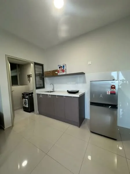 Kitchen features: white painted walls, glossy tile flooring, L-shaped kitchen countertop, stainless-steel sink, chrome pull-down faucet, built-in cabinets in grey, refrigerator with stainless-steel finish, microwave on countertop, wall-mounted cabinet above sink, window above sink, door leading to laundry area; style: modern.