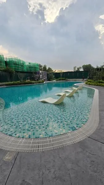 Exterior type: swimming pool deck; features: infinity edge pool, tiled pool surface with mosaic pattern, poolside loungers, landscaped garden area, surrounding greenery, concrete pool deck, fencing around pool area; style: modern.