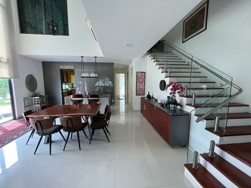 Dining features: round wooden dining table, upholstered dining chairs, pendant lighting above table, white walls, large windows with sheer curtains, polished tile flooring, decorative wall art, glass railing staircase, wooden staircase, open layout to kitchen, greenery view through windows; style: modern; view: garden. Kitchen features: grey cabinetry, stainless-steel appliances, kitchen island, recessed lighting, open layout to dining area; style: modern.