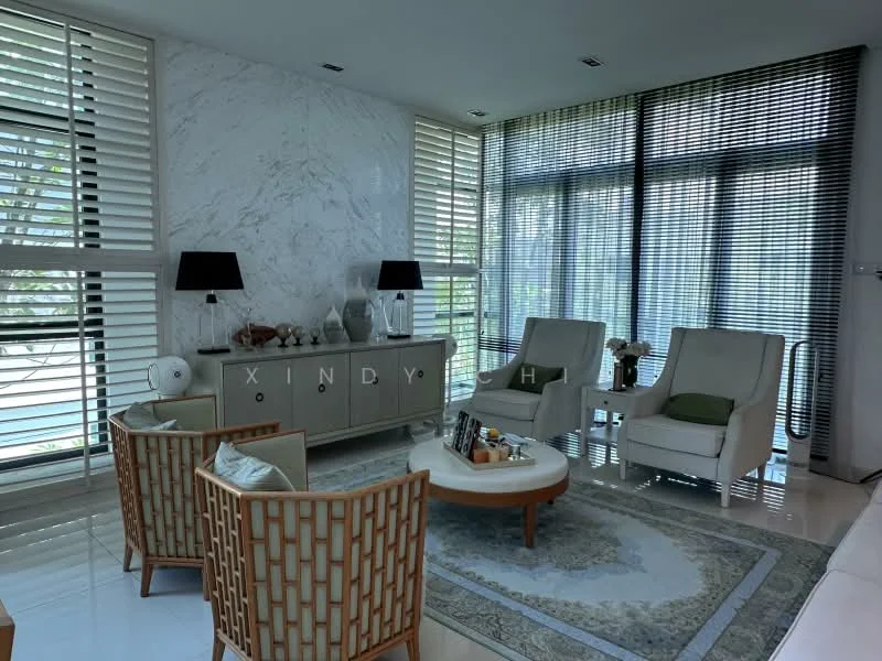 Living features: white marble accent wall, large floor-to-ceiling windows, horizontal wooden blinds, light grey upholstered armchairs, beige patterned area rug, round coffee table with wooden base, decorative console table, table lamps with black shades, green accent cushion, decorative vases, houseplants, wall-mounted decor; style: modern; view: garden.