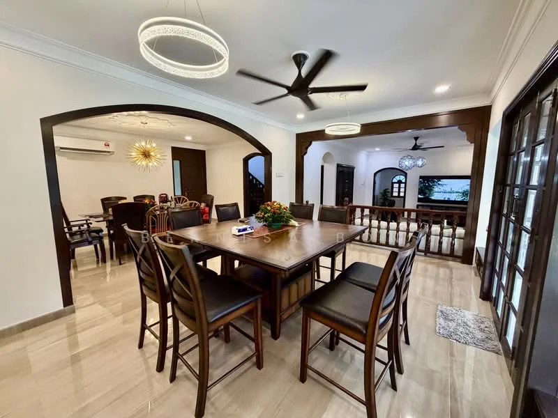 Dining features: wooden dining table, 8 dining chairs, chandelier light fixture, 5-blade ceiling fan, marble tile flooring, white painted walls, arched doorways, decorative wall paneling, decorative centerpiece on table, wall-mounted TV in background; style: modern. Living features: sofa set, coffee table, wall-mounted TV, decorative wall paneling, white painted walls, marble tile flooring; style: modern.