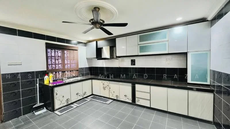 Kitchen features: black granite countertop, white cabinetry with floral design, stainless-steel range hood, built-in oven, black tile backsplash, grey ceramic tile flooring, 5-blade ceiling fan with light, window with wooden grille, sink with faucet, kitchen island, recessed lighting; style: modern.