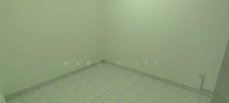 Room features: white painted walls, ceramic tile flooring, corner room, no visible windows, minimal decor, empty space.