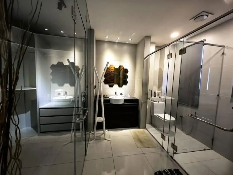 Bathroom features: double-sink vanity with black cabinet, white ceramic sinks, chrome basin mixers, framed mirror, glass shower enclosure, walk-in shower with handheld shower, toilet, tile flooring, recessed downlights, wall-mounted towel rack, decorative wall art, built-in shelving, white walls; style: modern.