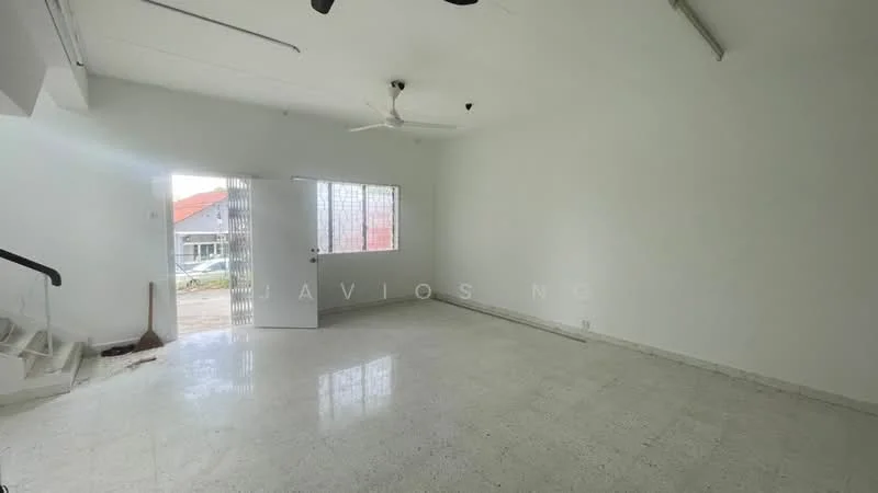 Living features: white painted walls, polished concrete flooring, ceiling fan, large window with grid pattern, main entrance door, staircase leading to upper level, natural light from window, open layout.