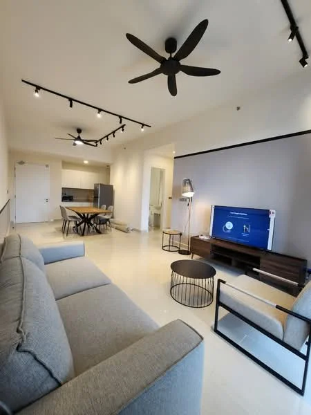 Living features: 3-seater fabric sofa in grey, 2-blade ceiling fan, recessed LED downlights, wall-mounted TV, TV console, coffee table, dining table with 4 chairs, open-plan layout, light-colored walls, tile flooring; style: modern. Kitchen features: stainless-steel fridge, built-in cabinetry, countertop, open layout to living area; style: modern.