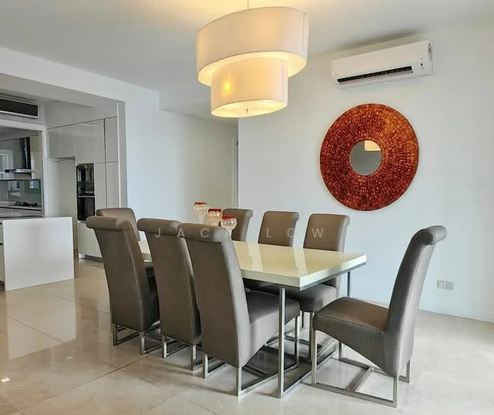 Dining features: 6-seater dining table with white top, upholstered dining chairs in grey, large pendant light fixture, round decorative mirror on wall, wall-mounted split AC unit, cream painted walls, glossy tile flooring; style: modern. Kitchen features: open kitchen layout, stainless-steel appliances, white cabinetry; style: modern.