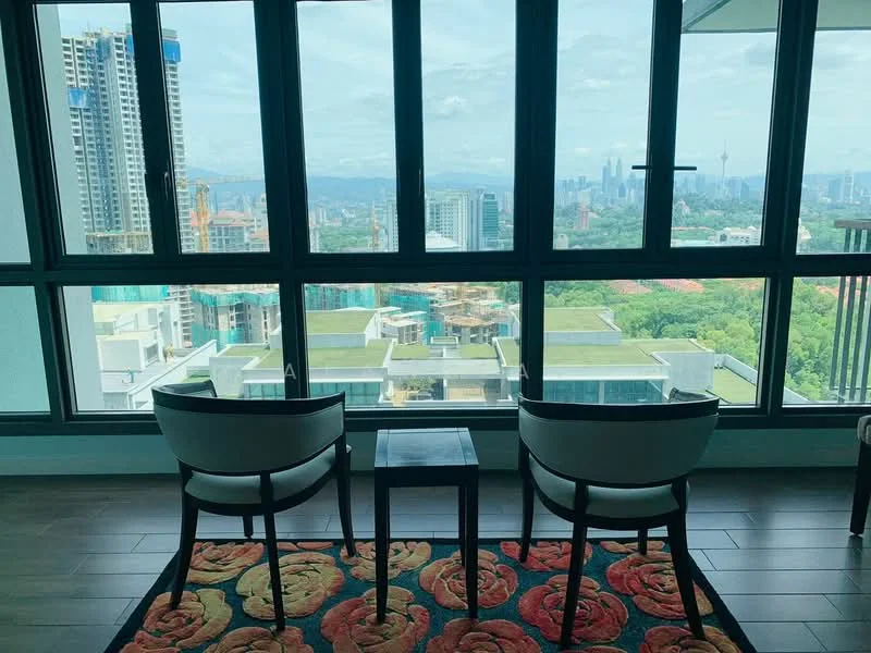 Room features: floor-to-ceiling windows, city skyline view, wooden flooring, area rug with floral pattern, two accent chairs, small side table; style: modern; view: city.