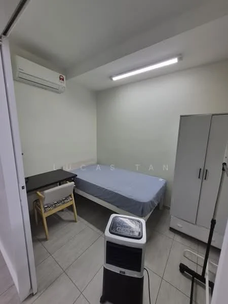 Bedroom features: single bed with grey bedding, wall-mounted air conditioning unit, light grey painted walls, tile flooring, LED ceiling lights, wooden study table, plastic chair, wardrobe with sliding doors, portable air cooler; style: minimalist.