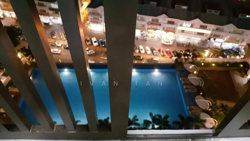 Exterior type: high-rise condominium; features: infinity pool, pool deck with loungers, surrounding palm trees, city street view, night lighting, adjacent commercial buildings; style: modern.