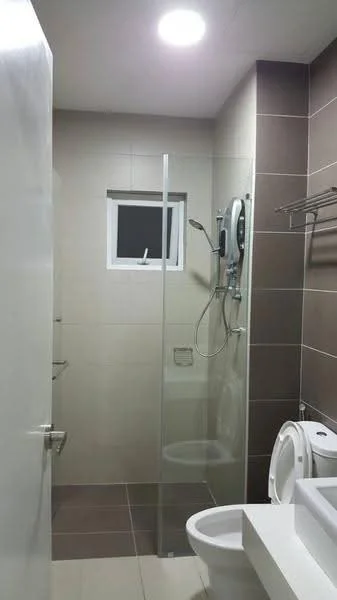 Bathroom features: walk-in shower with glass enclosure, rain shower head, handheld shower, white toilet, single-sink vanity with cabinet, mirror above sink, tile flooring, light grey wall tiles, dark brown accent wall tiles, window for natural light, chrome towel rack, recessed ceiling lights; style: modern.