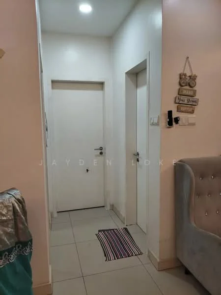 Room features: white painted walls, tile flooring, recessed ceiling lights, wooden door, door with silver handle, striped doormat, grey fabric sofa, decorative wall sign; style: modern.
