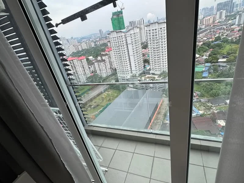Room features: glass sliding door, balcony with glass railing, grey tiled flooring, city skyline view, curtains, exterior wall with windows; style: modern; view: city.