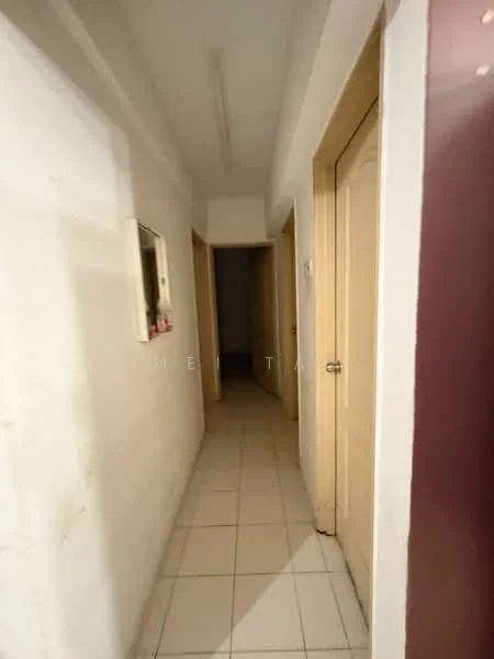 Hallway features: white painted walls, tile flooring, ceiling light fixture, two wooden doors, narrow hallway layout, mirror on wall, neutral color scheme.
