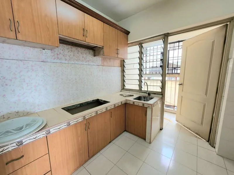 Kitchen features: wood cabinetry, laminate countertop, single-bowl stainless-steel sink, chrome pull-down faucet, white tiled backsplash with floral pattern, built-in stove, window with metal grille, door leading to balcony, white tiled flooring, light-colored walls.