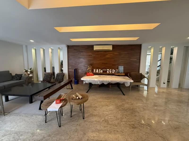 Living features: grey fabric sofa, wood coffee table, 2 wooden side tables, marble flooring, wood accent wall, recessed ceiling lights, air conditioning unit, decorative items on table, area rug, floor-to-ceiling windows, open layout, neutral wall color; style: modern.