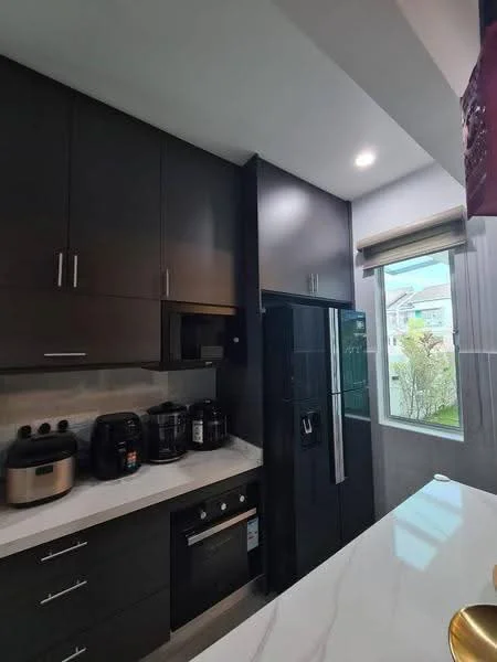 Kitchen features: black cabinetry, white marble countertop, stainless-steel fridge, built-in oven, 4-burner gas hob, black microwave, black coffee machine, black toaster, window with garden view, recessed downlights; style: modern; view: garden.