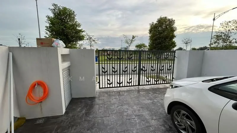 Exterior type: car porch; features: paved flooring, metal gate, white painted walls, landscaped area with trees, open space, driveway, visible street, utility storage area; style: modern.