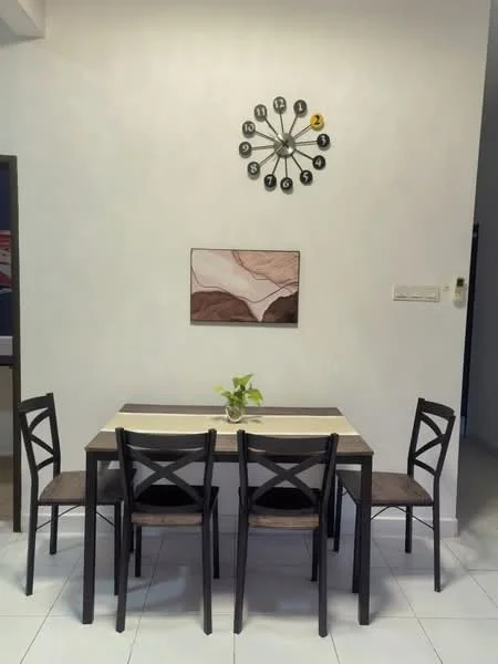 Dining features: 4-seater dining table, black wooden dining chairs, white ceramic floor tiles, light grey painted walls, decorative wall clock, framed artwork, small indoor plant on table; style: modern.