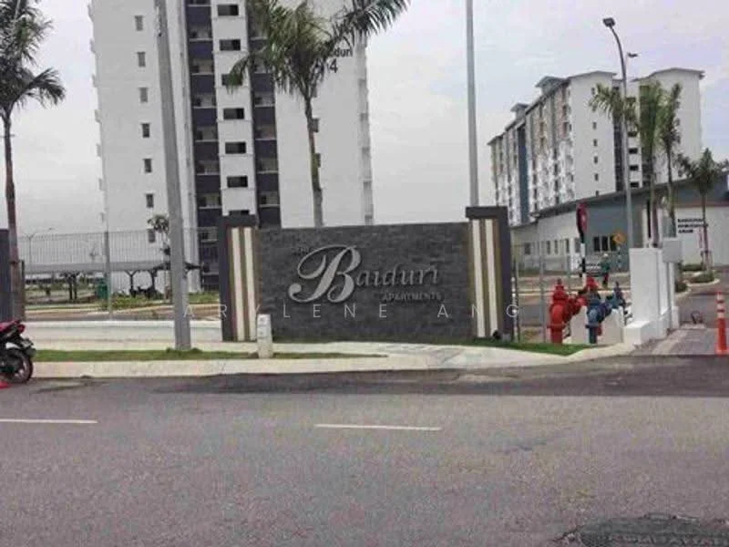 Exterior type: low-rise apartment block; features: stone-clad entrance sign, palm trees, manicured landscaping, paved walkway, multiple storeys visible, parking area, street view, surrounding greenery; style: modern.