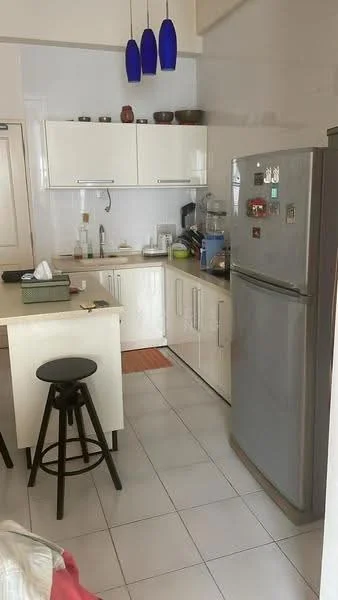 Kitchen features: white cabinetry, granite countertop, stainless-steel fridge, built-in oven, ceramic tile flooring, single-bowl stainless-steel sink, chrome pull-down faucet, kitchen island with seating, blue pendant lights, microwave, coffee machine, wall-mounted cabinets; style: modern.