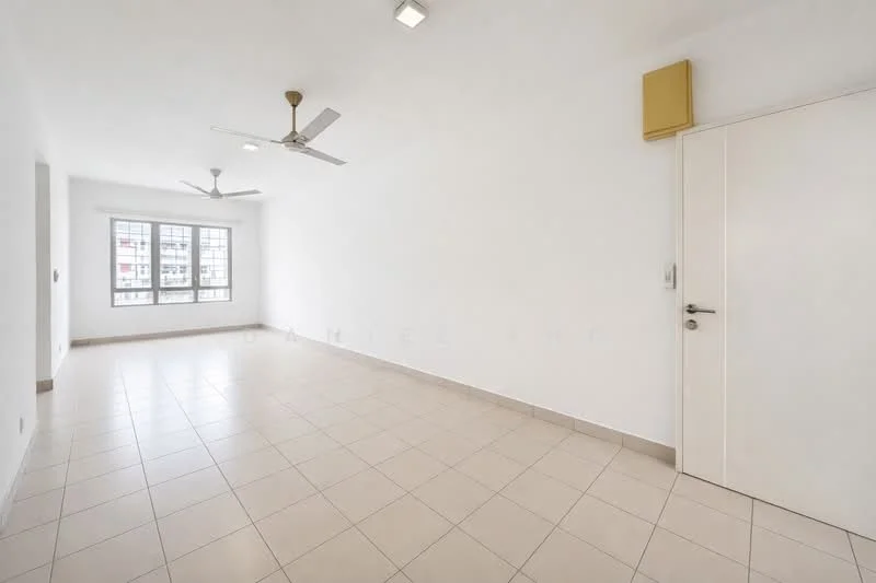 Living features: white painted walls, cream tiled flooring, 2 ceiling fans, large window with grid pattern, neutral color scheme, no visible furniture, light fixtures on ceiling, door leading to another room; style: modern.