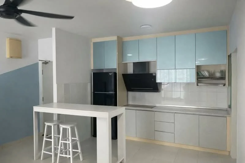 Kitchen features: light blue upper cabinets, grey lower cabinets, stainless-steel sink, chrome pull-down faucet, built-in oven, black range hood, black refrigerator, white countertop, white bar table, two white stools, white walls, light-colored flooring, ceiling light fixture, ceiling fan; style: modern.