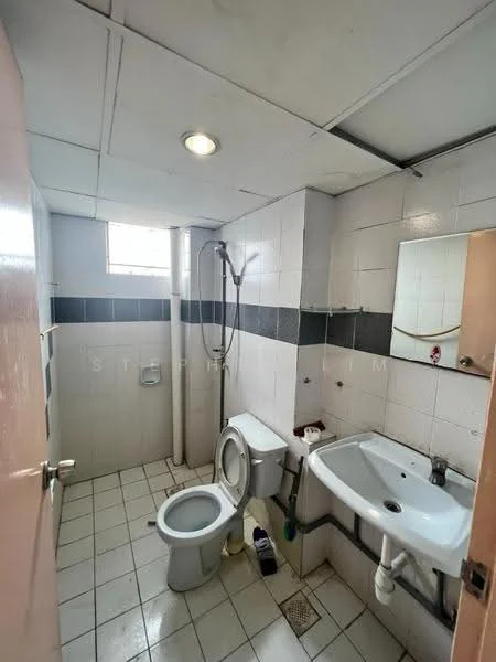 Bathroom features: white tiled walls, grey accent tiles, white ceramic floor tiles, single-sink vanity, chrome basin mixer faucet, framed mirror, one-piece toilet, shower with handheld showerhead, exhaust fan, window for natural light.