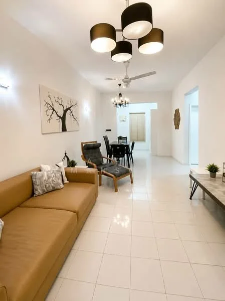 Living features: 3-seater leather sofa in tan, armchair with wooden frame, coffee table with stone top, white painted walls, glossy white tile flooring, 5-blade ceiling fan with light, chandelier with multiple bulbs, decorative wall art, houseplants in ceramic pots, dining table with black chairs visible in background; style: modern.