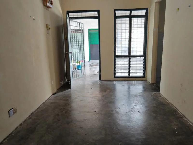 Room features: concrete flooring, cream painted walls, metal security door, sliding windows with black frames, natural light from windows, open layout, visible corridor, minimal decor; style: minimalist.