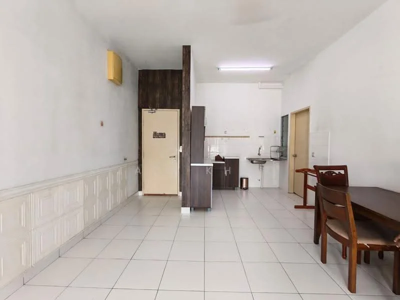 Room features: white painted walls, tile flooring, 1 wall-mounted split AC, wooden dining table, 2 wooden chairs, kitchenette with sink, cabinets in dark wood finish, recessed ceiling lights, door leading to another room, open layout, neutral color scheme; style: modern.
