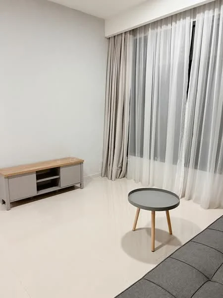 Living features: light grey painted walls, white ceiling, floor-to-ceiling windows, sheer curtains, grey sofa, small round coffee table with grey top and wooden legs, TV console in light grey, polished tile flooring; style: modern.