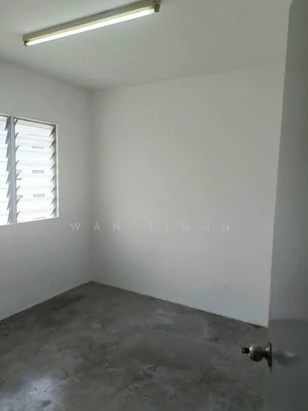 Room features: white painted walls, concrete flooring, sliding window with horizontal slats, fluorescent ceiling light; style: minimalist.