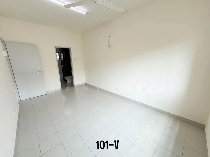 Room features: white painted walls, grey tiled flooring, ceiling fan, single door, window, light fixture, corner with bathroom door, empty space.
