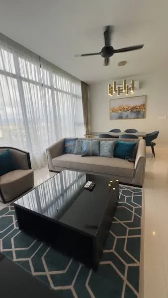Living features: 3-seater fabric sofa in light grey, blue decorative cushions, black coffee table, area rug with geometric pattern, 5-blade ceiling fan with light, floor-to-ceiling windows with sheer curtains, wall-mounted artwork, dining area with 6 upholstered chairs in background; style: modern; view: city.