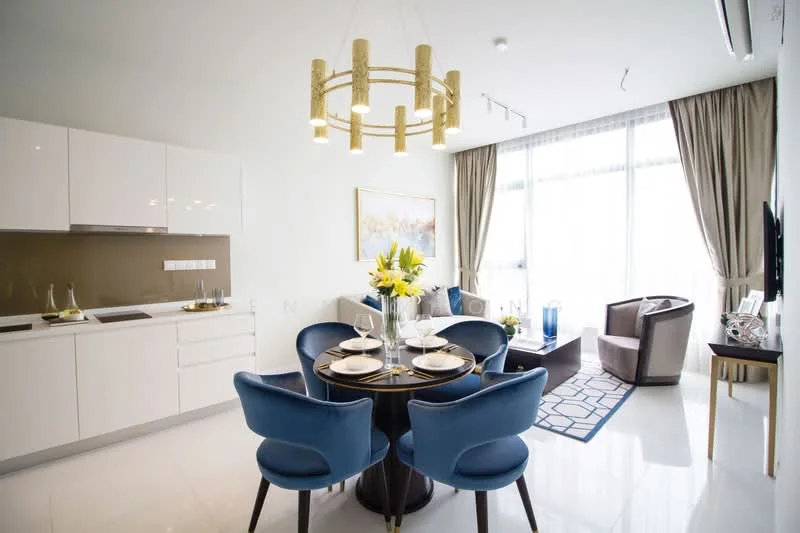 Dining features: round dining table, 4 upholstered dining chairs in blue, chandelier with gold accents, white cabinetry, grey backsplash, stainless-steel sink, built-in stove, refrigerator, white walls, large windows with sheer curtains, decorative vase with flowers, area rug with geometric pattern; style: modern; view: city. Living features: 2-seater fabric sofa in brown, accent chair in brown, coffee table, wall-mounted TV, decorative artwork, light-colored curtains, polished tile flooring; style: modern; view: city. Kitchen features: white cabinetry, grey backsplash, stainless-steel sink, built-in stove, refrigerator; style: modern.