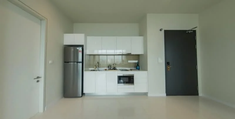 Kitchen features: white cabinetry, stainless-steel fridge, built-in microwave, stainless-steel sink, chrome pull-down faucet, ceramic tile backsplash, white countertop, induction hob, wall-mounted kitchen cabinet, open shelving, neutral wall color, tile flooring, recessed downlights; style: modern.