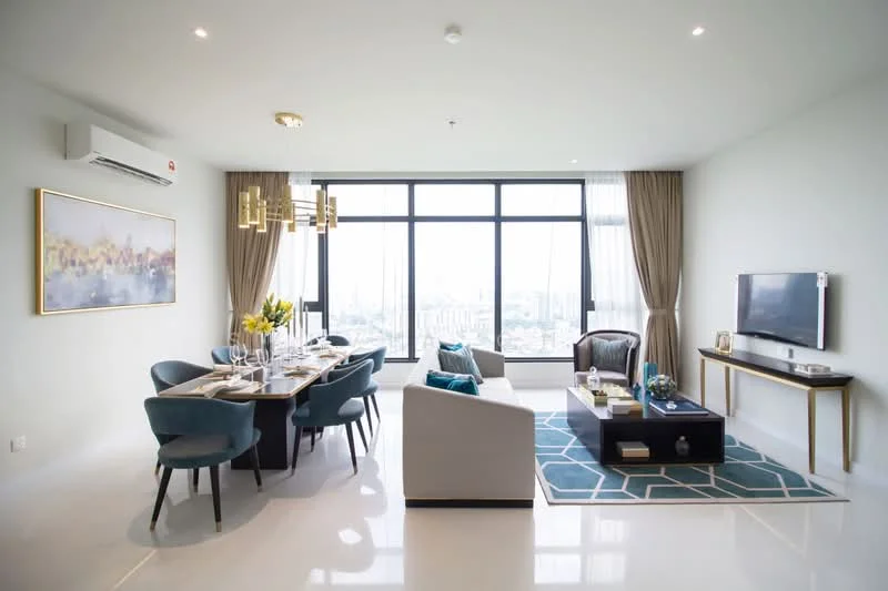 Living features: floor-to-ceiling windows, grey fabric sofa, 2 accent chairs in blue, coffee table with dark wood finish, TV console with wall-mounted TV, area rug with geometric pattern, recessed LED downlights, wall-mounted air conditioning unit, decorative artwork on wall, dining table with 6 upholstered chairs, vase with flowers on dining table, curtains in beige, light fixture with multiple bulbs; style: modern; view: city.