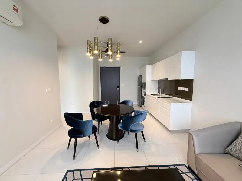 Dining features: round dining table, 4 upholstered dining chairs in blue, chandelier with multiple bulbs, white cabinetry, grey backsplash, stainless-steel fridge, built-in oven, ceramic tile flooring, wall-mounted split AC, grey walls, open layout to kitchen, recessed lighting; style: modern. Living features: 3-seater fabric sofa in grey, coffee table with black frame, white walls, large window, open layout to dining area; style: modern.