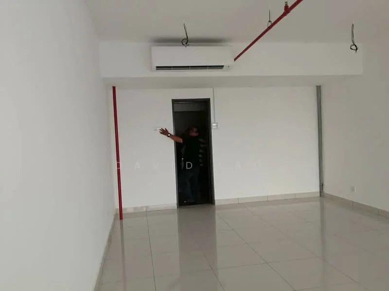Room features: white painted walls, polished ceramic tile flooring, 1 wall-mounted split AC, doorway leading to another room, exposed ceiling with red pipes, neutral color scheme, no visible furniture or decor; style: modern.