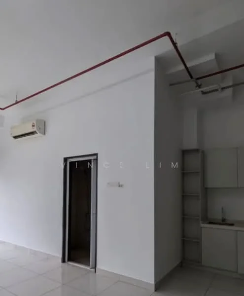 Room features: white painted walls, tile flooring, 1 wall-mounted split AC, kitchen cabinetry, sink, red exposed piping, doorway, light fixtures.