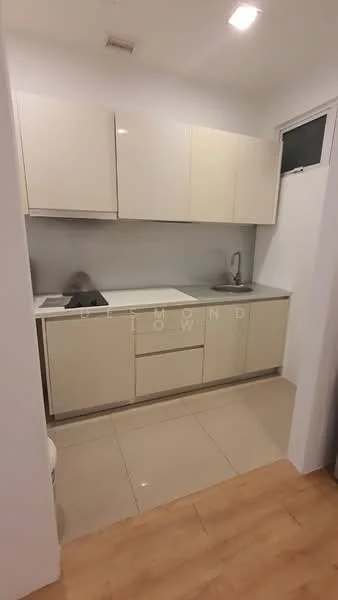 Kitchen features: light beige cabinetry, grey countertop, single-bowl stainless-steel sink, chrome pull-down faucet, built-in gas hob, tile backsplash, ceramic tile flooring, recessed downlights, window for natural light; style: modern.