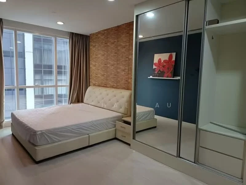 Bedroom features: queen-size bed with upholstered headboard, white bedding, built-in wardrobe with sliding mirror doors, nightstand with drawer, wooden flooring, accent wall with brick pattern, floor-to-ceiling windows, curtains, decorative shelf with artwork; style: modern; view: city.