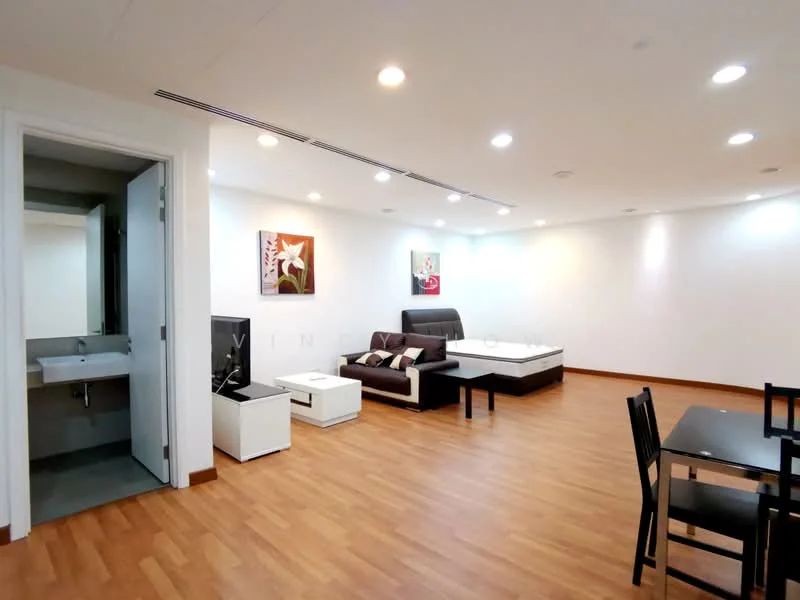Living features: laminate flooring, white painted walls, recessed downlights, 3-seater fabric sofa in dark brown, L-shape sectional sofa, coffee table, TV console, wall-mounted TV, decorative artwork, dining table with 4 chairs; style: modern. Room features: sink, white painted walls, grey tiled flooring, door leading to another room.