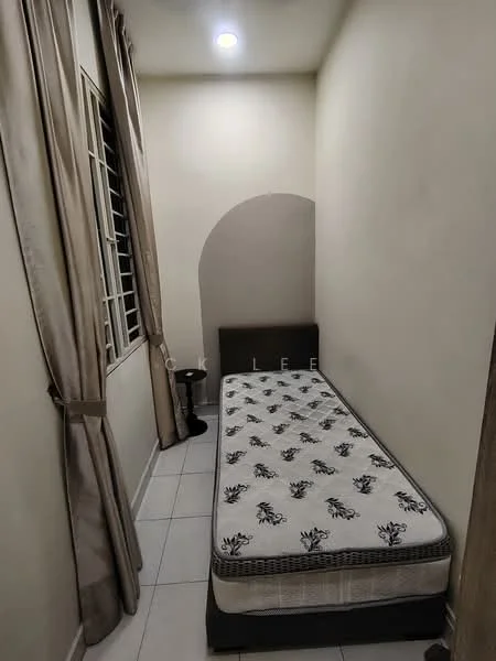 Bedroom features: single bed, mattress with floral pattern, white painted walls, tile flooring, curtains in beige, window with metal grille, nightstand, ceiling light.